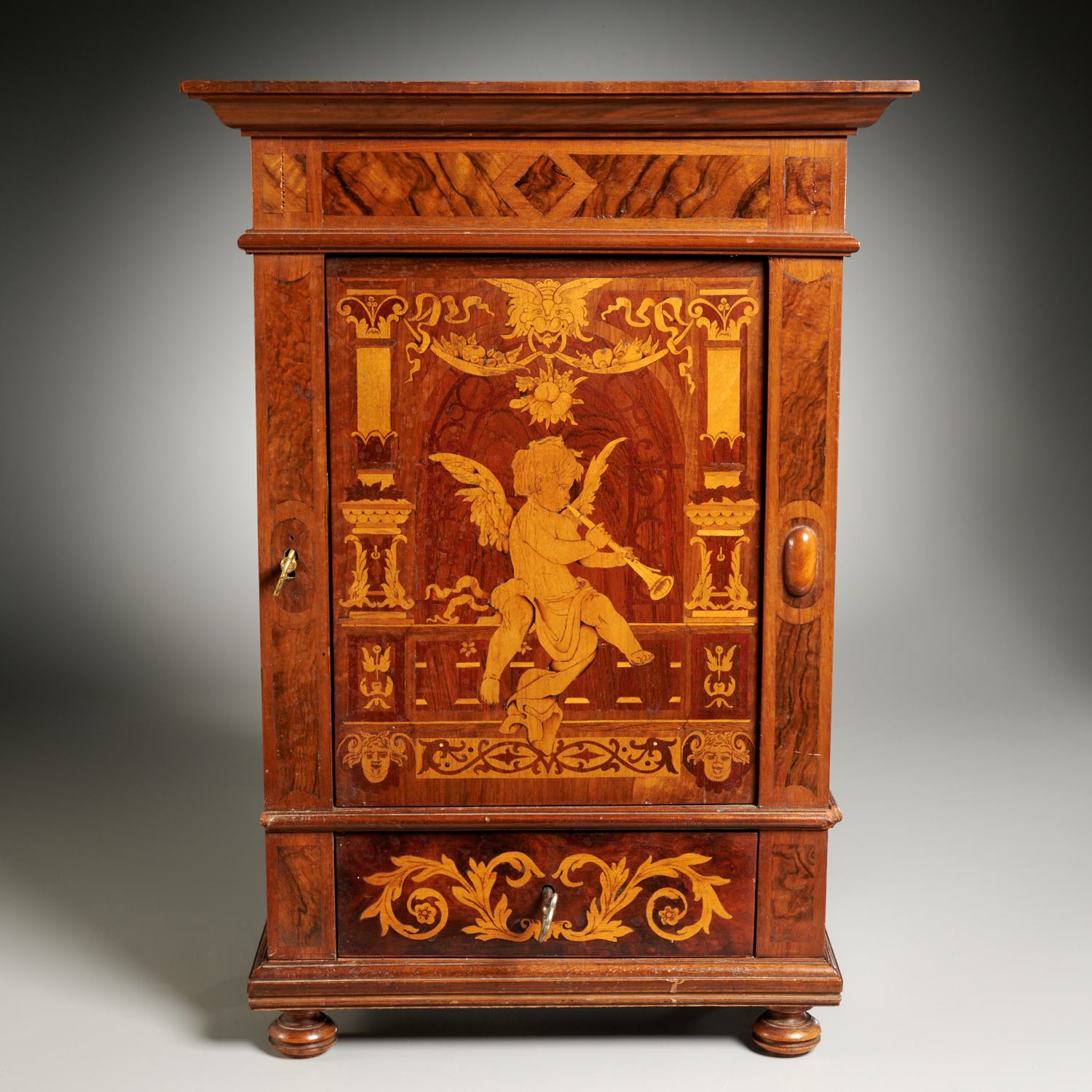 Appraisal: CONTINENTAL NEOCLASSIC MARQUETRY TABLETOP CABINET th c figured mahogany case