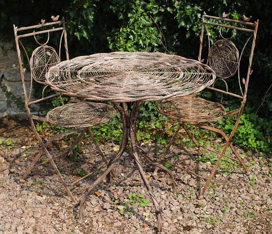 Appraisal: A CIRCULAR WIREWORK TABLE together with a pair of matching