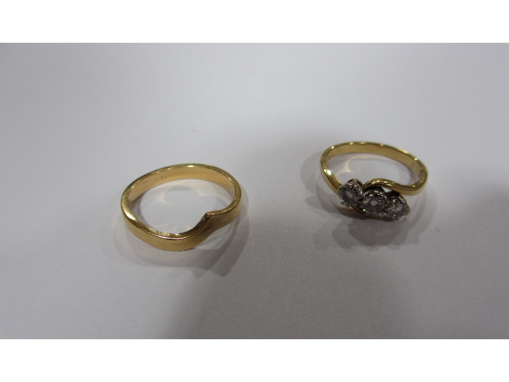 Appraisal: Lot comprising an ct gold diamond three stone twist ring