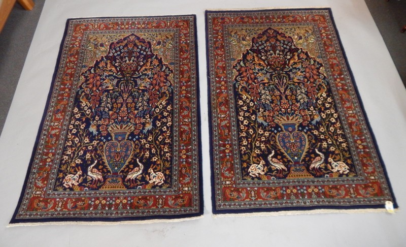 Appraisal: A pair of part silk Persian style rugs with a