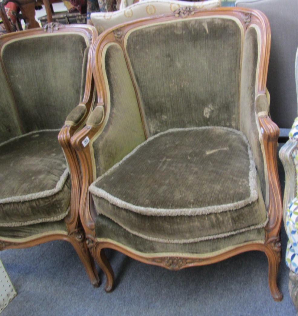 Appraisal: A pair of Louis XV style parcel gilt stained beech