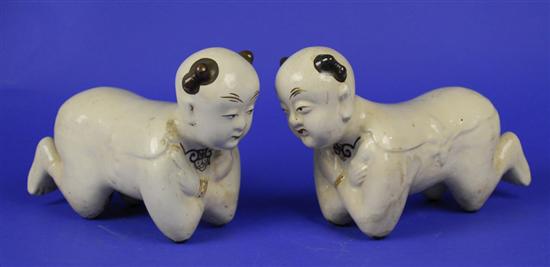 Appraisal: PAIR OF CHINESE CIZHOU STYLE FIGURAL FORM FUNERARY PILLOWS length