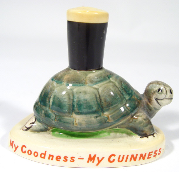 Appraisal: Carltonware Guinness advertising figure a turtle mounted with a pint