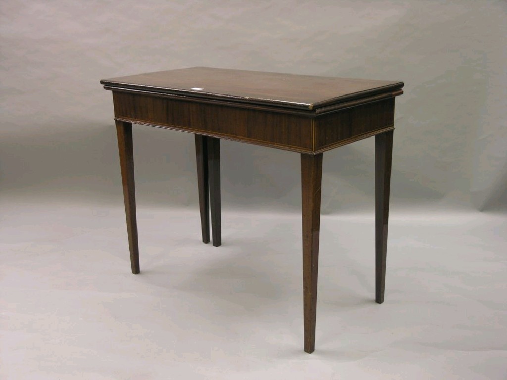 Appraisal: A mahogany tea table th century with modifications hinged top