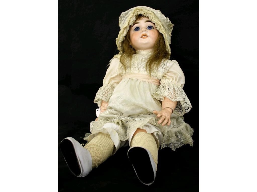 Appraisal: Armand Marseille doll with porcelain face and closing eyes dressed