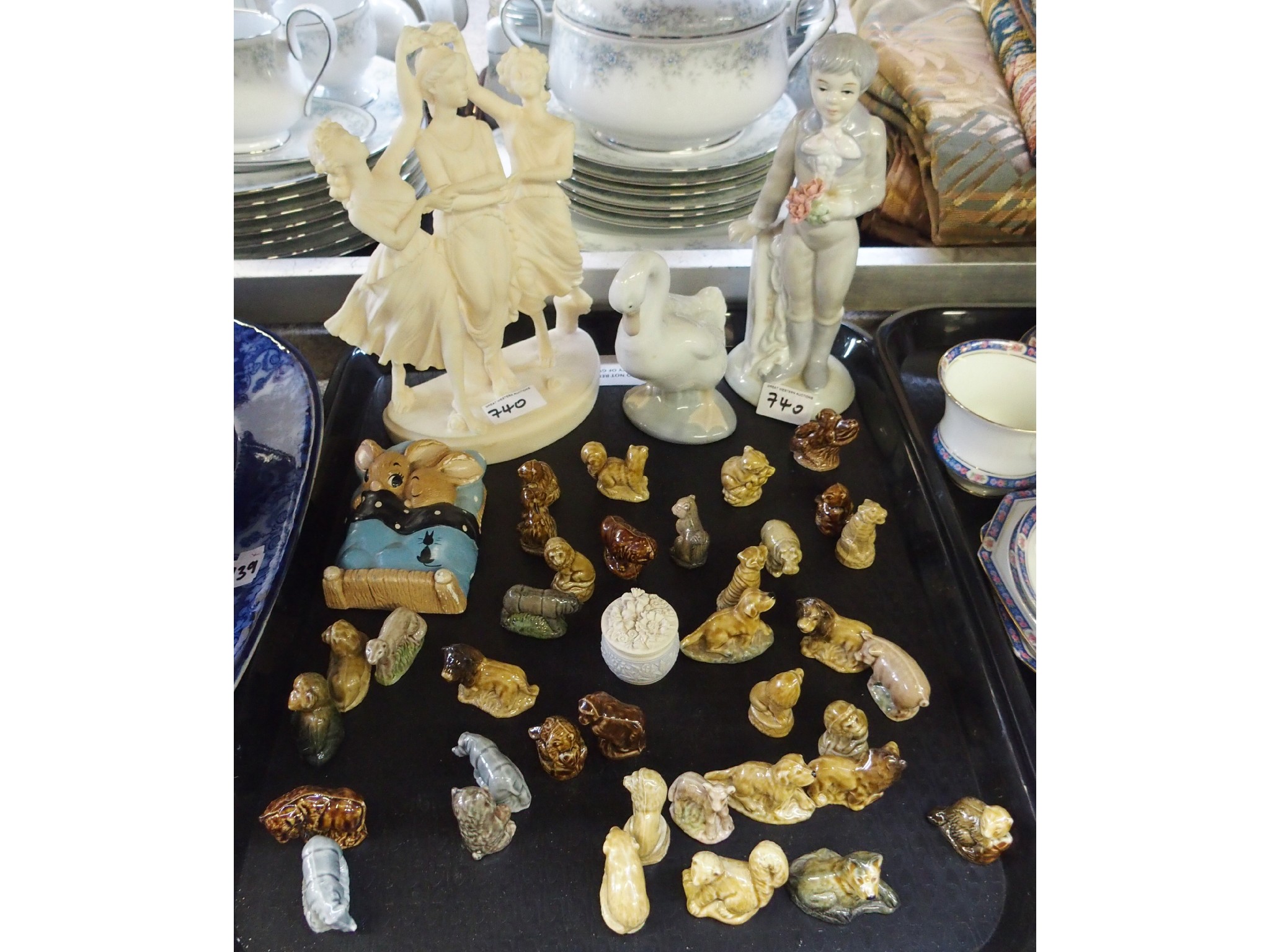 Appraisal: Tray comprising group of porcelain figural table ornaments Nao figure