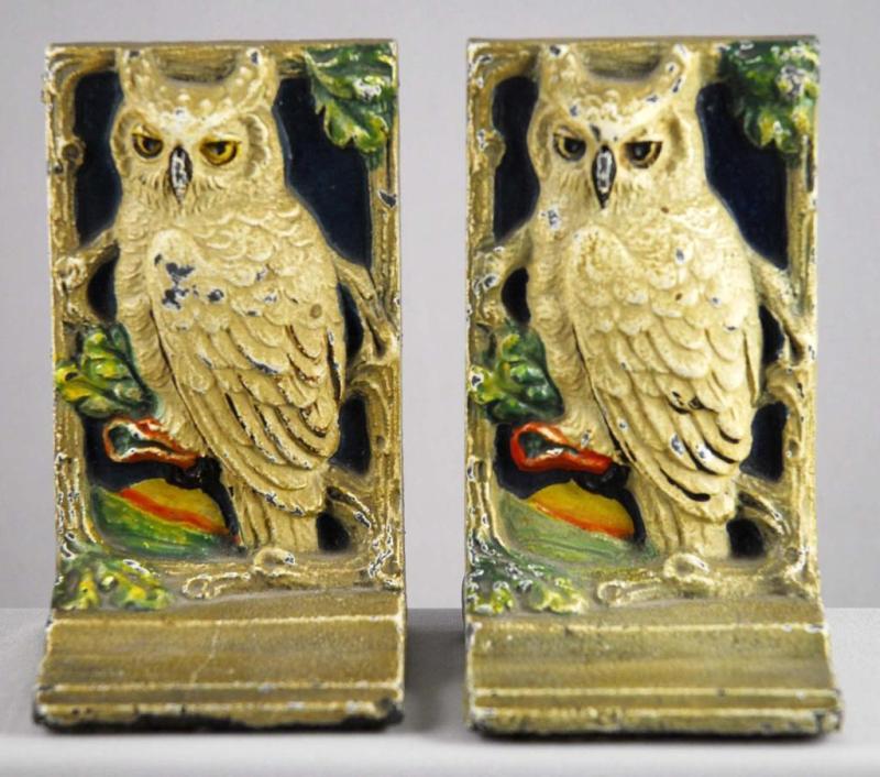 Appraisal: Lot of Cast Iron Owl Bookends Description Felt bottoms Paint