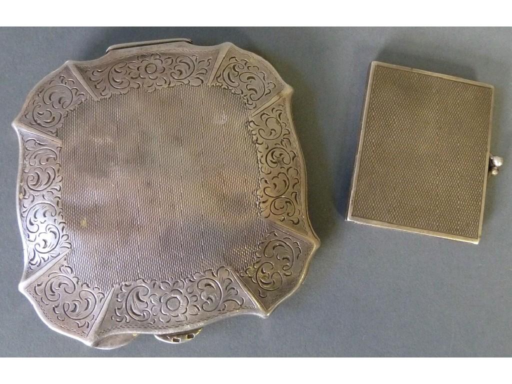 Appraisal: LADY'S SILVER COLOURED METAL POWDER COMPACT square with serpentine outline