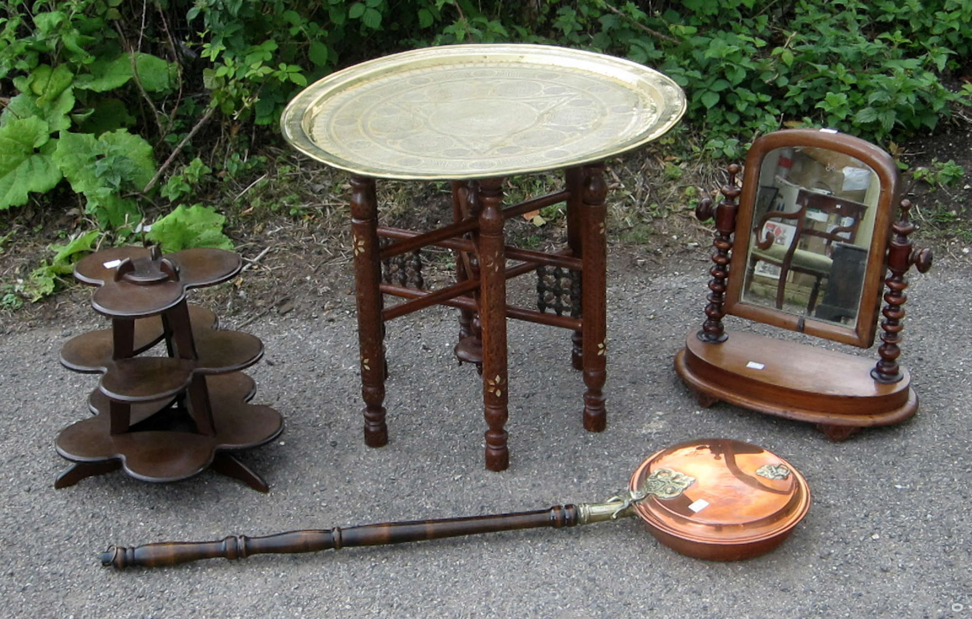 Appraisal: Hardwood brass topped benares table mahogany bedroom mirror cake stand