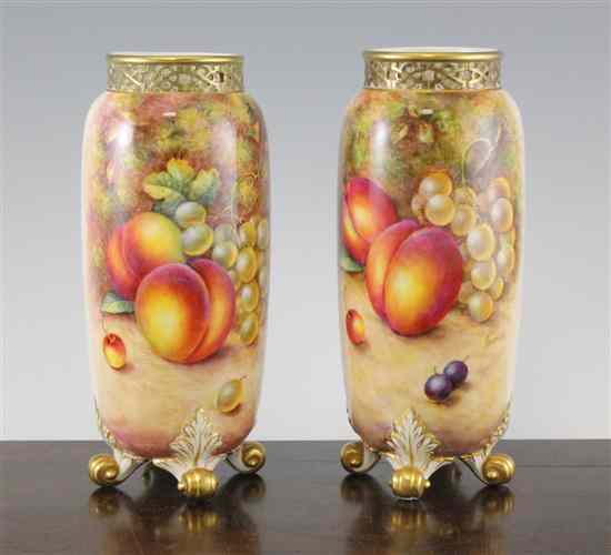 Appraisal: A pair of Royal Worcester vases painted by John Freeman