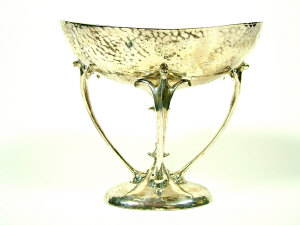 Appraisal: An Edwardian Art Nouveau style boat shaped shallow bowl with