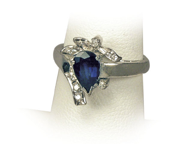 Appraisal: Pleasant K white gold lady's ring set with a center