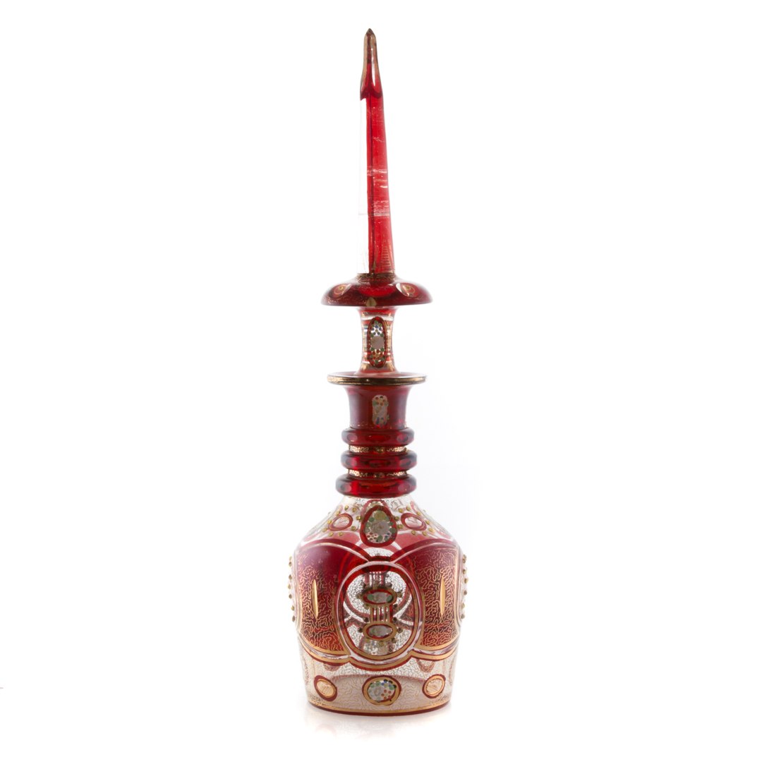 Appraisal: Large Moser enameled ruby glass decanter bulbous form with ring