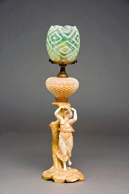 Appraisal: A Royal Worcester figural lamp dated in the form of