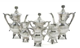 Appraisal: AN AESTHETIC SILVER-PLATE TEA AND COFFEE SERVICE MERIDEN BRITANNIA CO