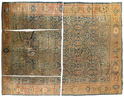 Appraisal: Sultanabad rug repeating floral designs on dark blue ground amber