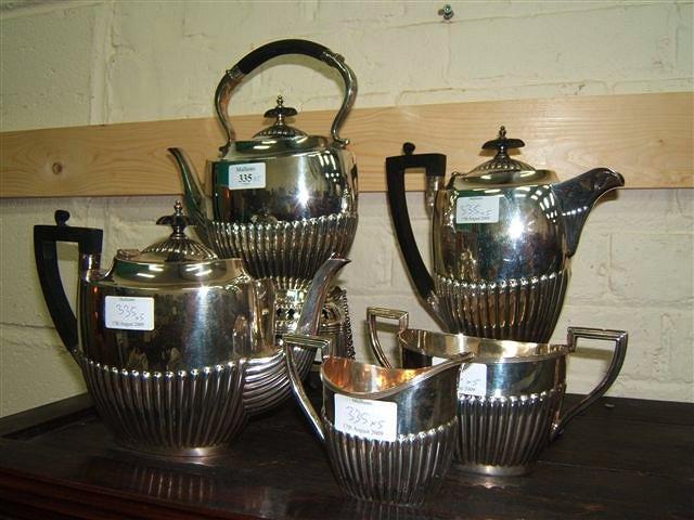 Appraisal: A five piece silver plated tea set by Walker Hall