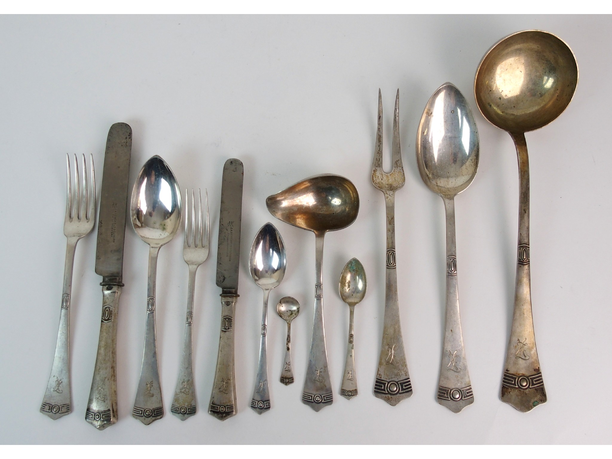 Appraisal: A Continental possibly French white metal party cutlery seteach piece