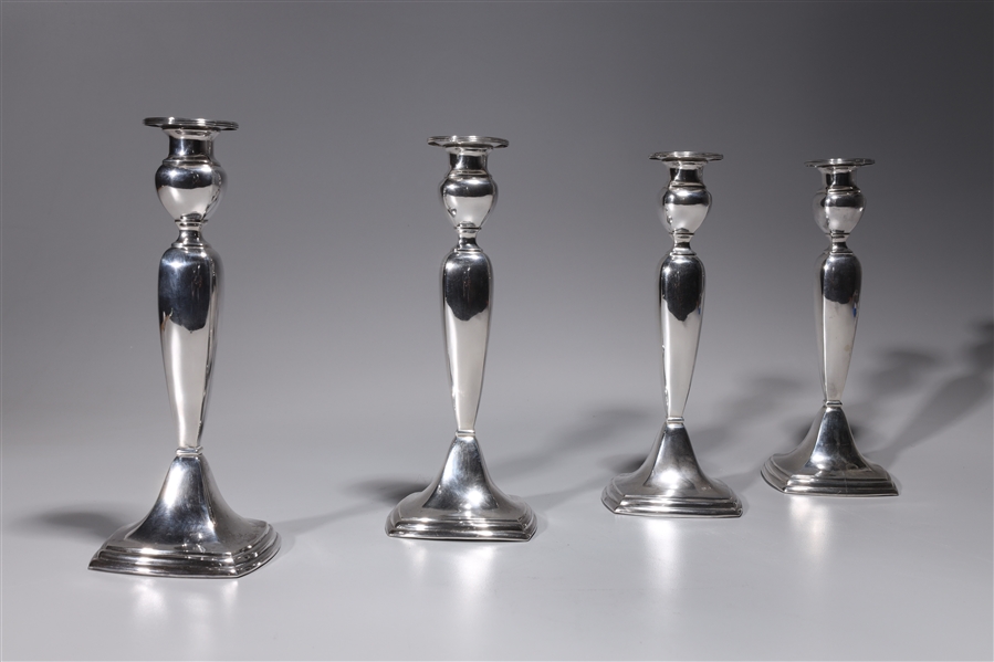 Appraisal: Set of four sterling silver weighted Chinese candle sticks each