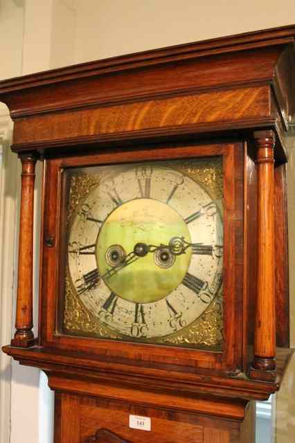 Appraisal: A TH CENTURY OAK LONGCASE CLOCK enclosing a brass dial