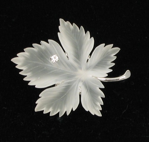 Appraisal: DIAMOND AND FROSTED GLASS LEAF BROOCH k white gold set