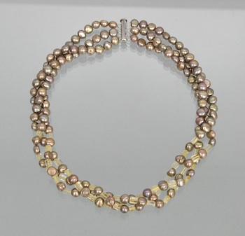 Appraisal: A Champagne Button Pearls and Citrine Three-Strand Necklace A three