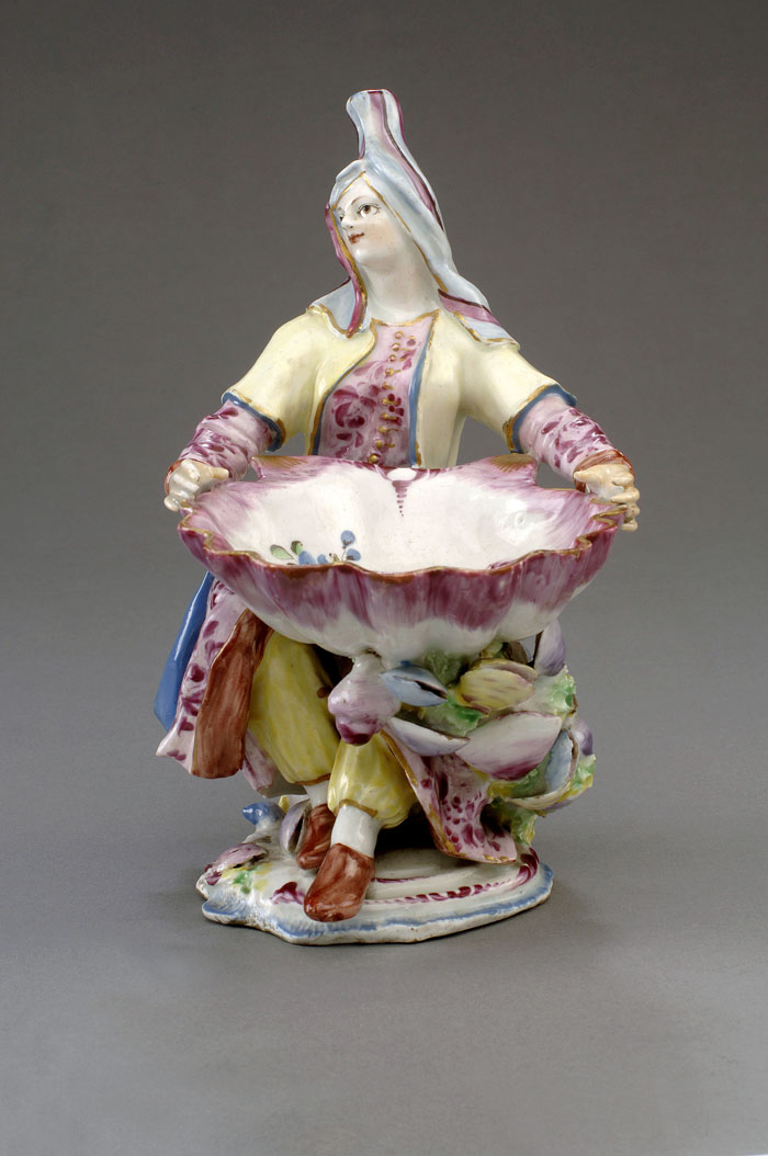 Appraisal: BOW PORCELAIN SWEETMEAT FIGURE OF A TURKISH LADY CIRCA Modelled