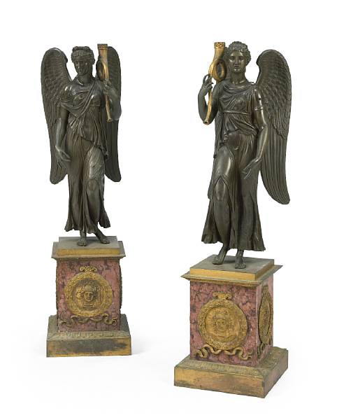 Appraisal: A pair of Empire patinated and gilt bronze figures first