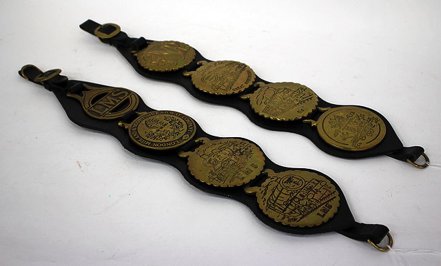 Appraisal: TWO SETS OF HORSE BRASSES mounted on leather straps one