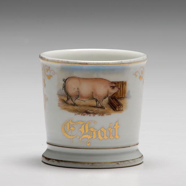 Appraisal: PIG FARMER'S OCCUPATIONAL SHAVING MUG porcelain with polychrome painted scene