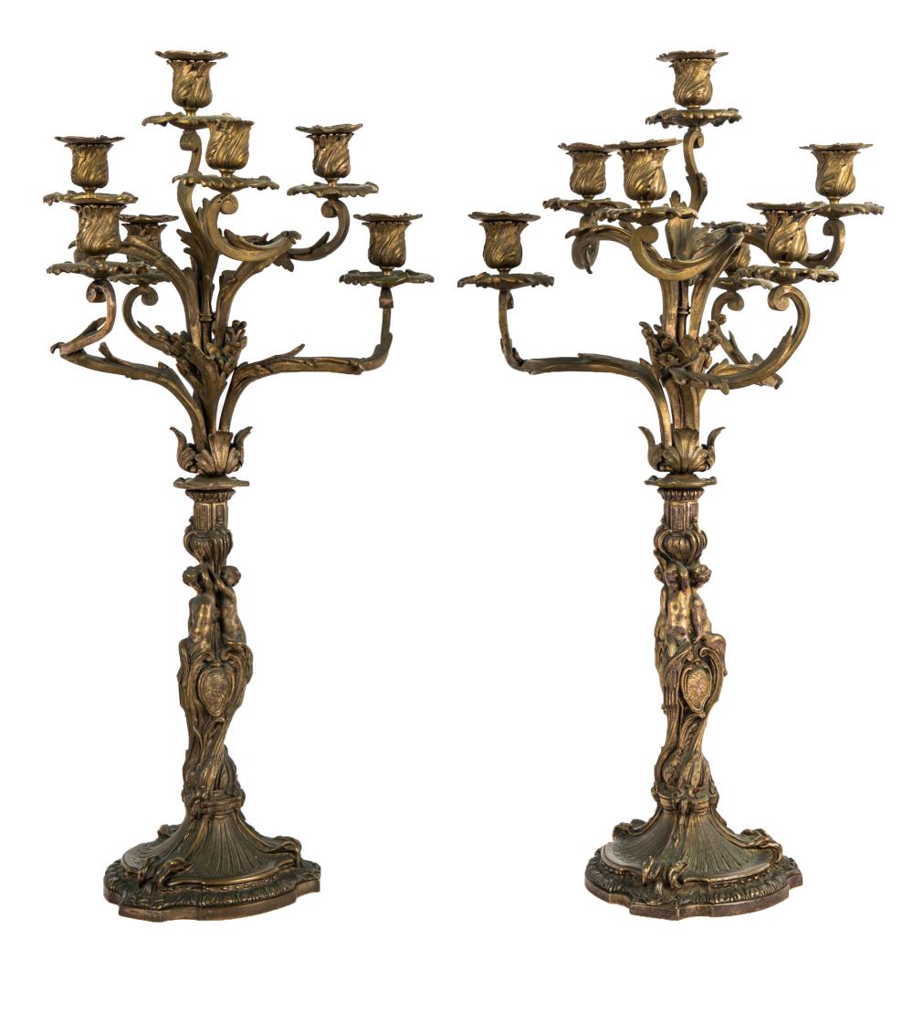 Appraisal: PAIR OF SILVERED BRONZE CANDELABRAwith figural design inches high Condition