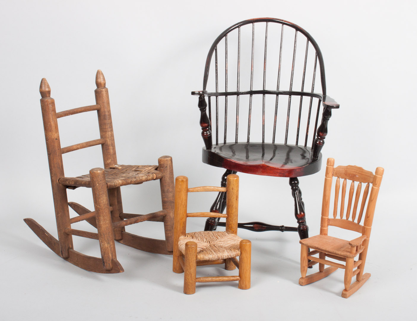 Appraisal: Assortment of miniature and doll wooden chairs