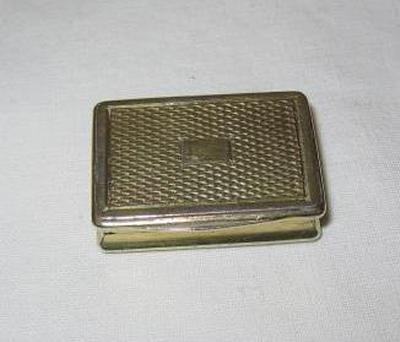 Appraisal: A GEORGIAN GILDED VINAIGRETTE of oblong form with engine turned