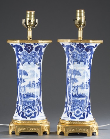 Appraisal: Each vase with slender waisted form and painted with lakeland