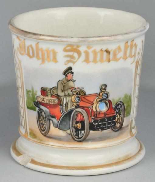 Appraisal: Early Chauffeured Automobile Shaving Mug Description Gilt name John Simeth