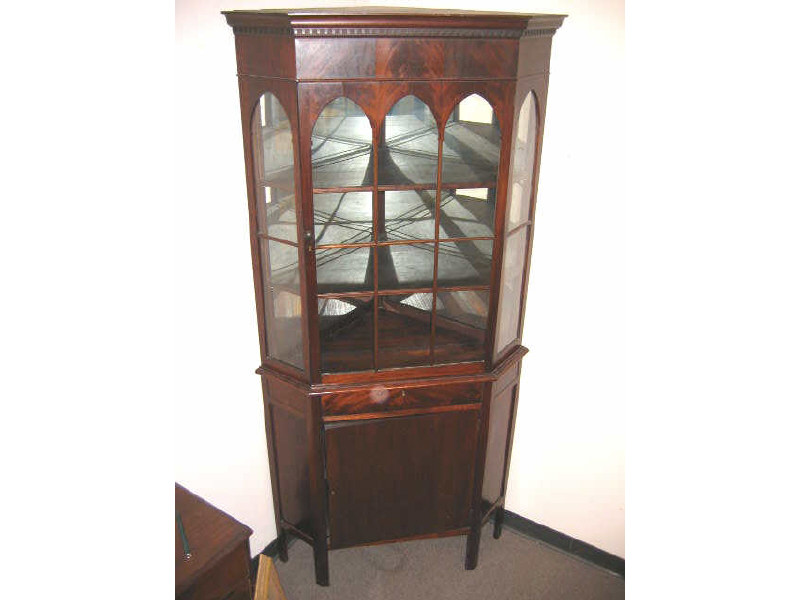 Appraisal: AMERICAN TH CENTURY MAHOGANY CORNER CUPBOARD Top member with dentil