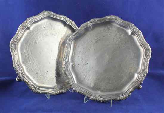 Appraisal: A pair of Victorian silver salvers of shaped circular form