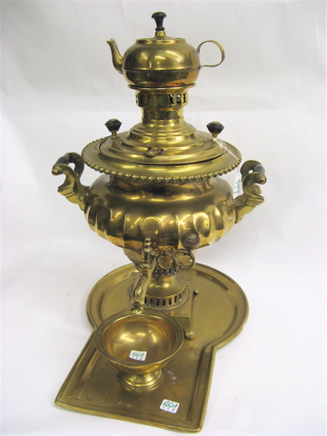 Appraisal: A RUSSIAN BRASS SAMOVAR with teapot and compote wood in