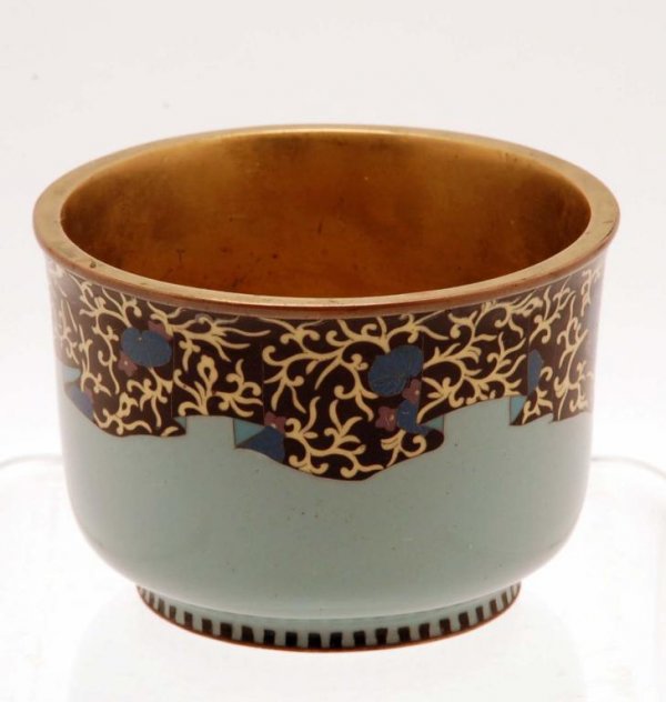 Appraisal: A cloisonne handleless cup Brass and copper body with cloisonne