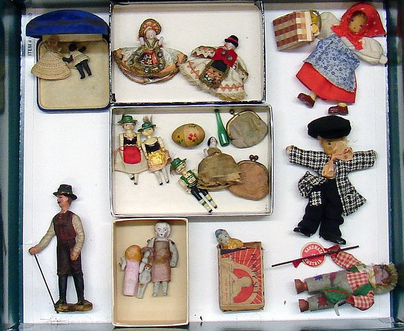 Appraisal: Lot Mini dolls - all bisque costume dolls wire strung