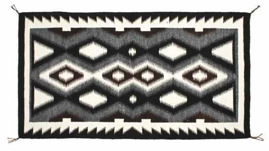 Appraisal: A Pair of Black Navajo Rugs the first having black