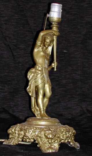 Appraisal: French Gilt-Spelter Figural Lamp of an Egyptian male bearing a