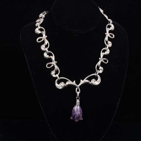 Appraisal: Mexican Silver Necklace with carved amethyst flower pendant and hollow