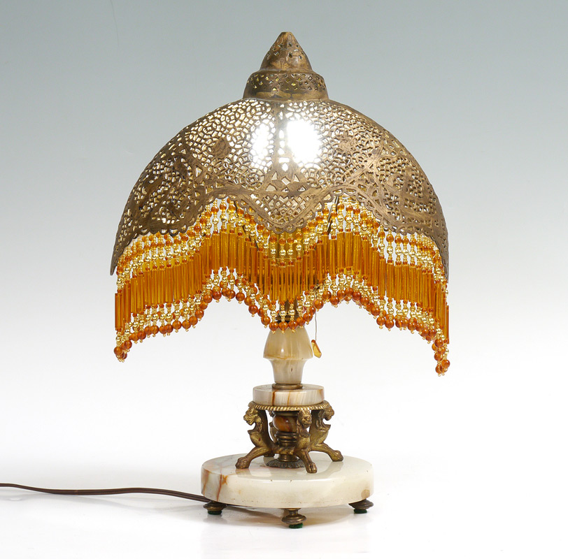 Appraisal: MOROCCAN TABLE LAMP WITH PIERCED SHADE Onyx base with figural