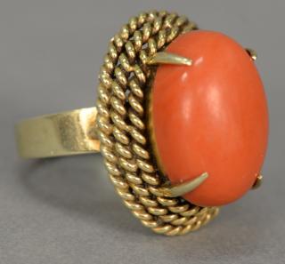 Appraisal: K gold ring set with cabachon cut coral ring size