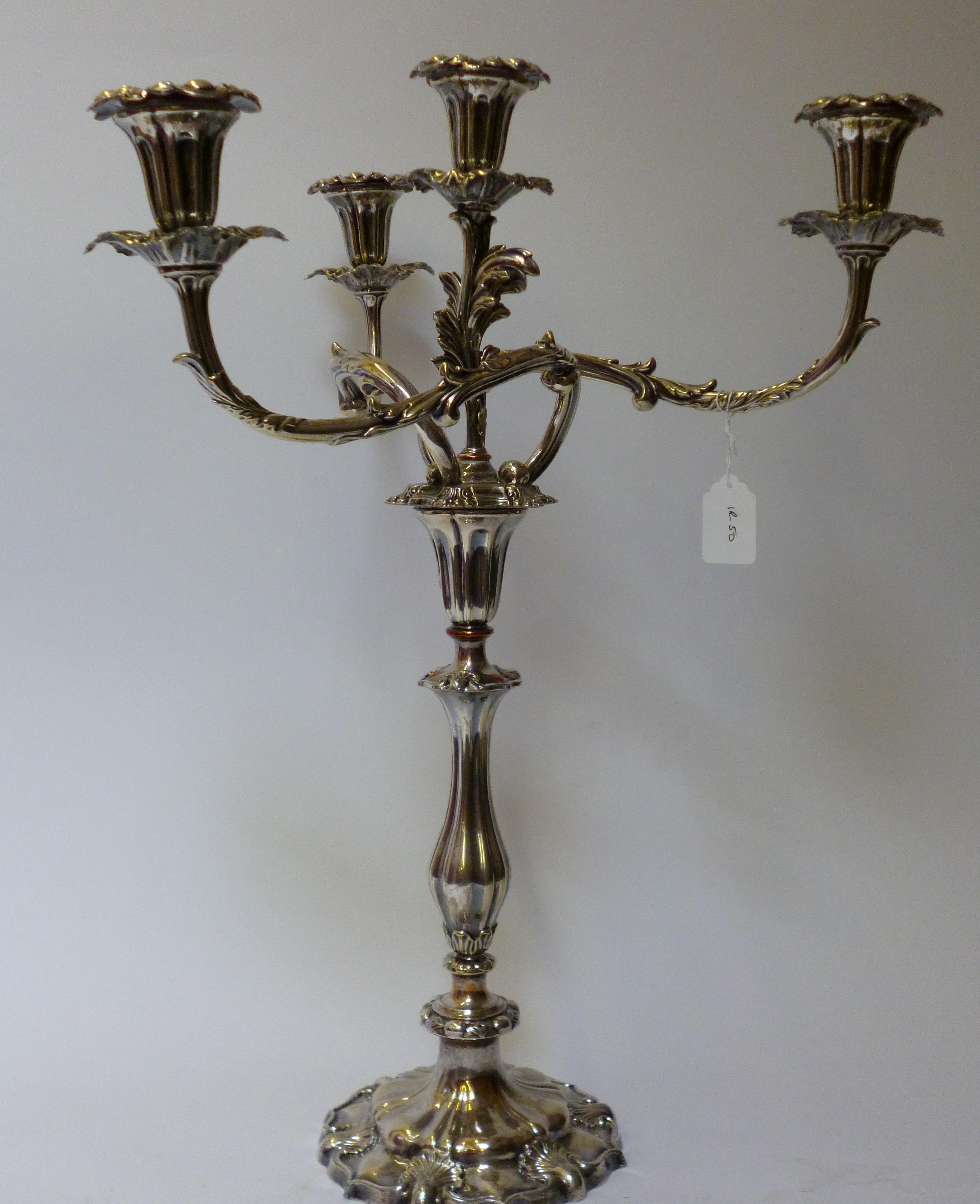 Appraisal: A THREE BRANCH FOUR LIGHT CANDELABRUM late th century the