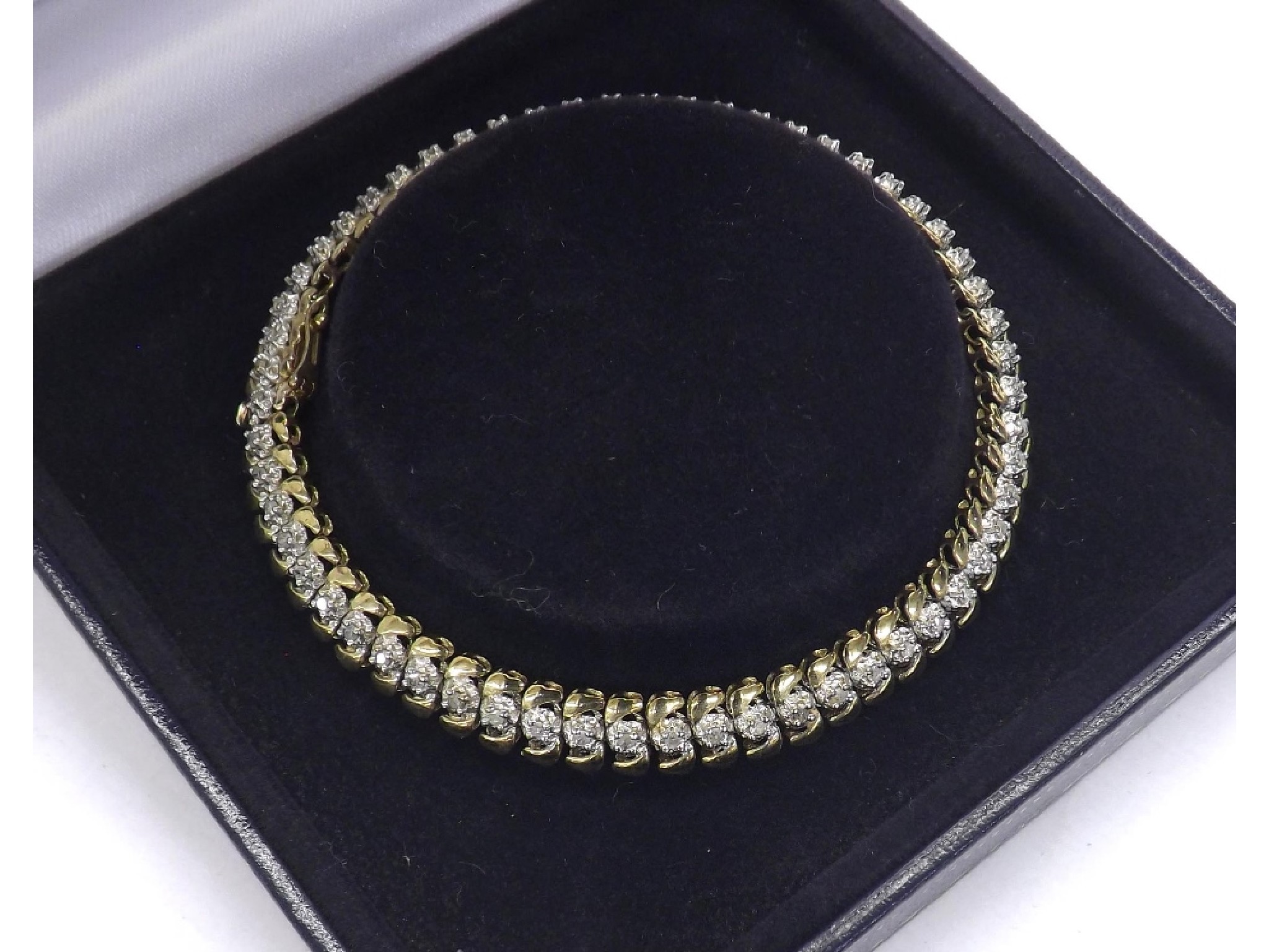 Appraisal: ct diamond two colour tennis bracelet set with round brilliant-cuts