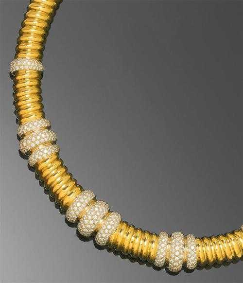 Appraisal: GOLD AND BRILLIANT-CUT DIAMOND NECKLACE Yellow gold g Casual-elegant tube