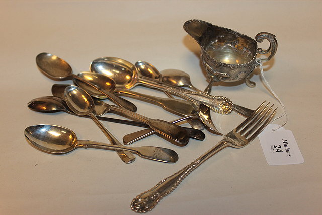 Appraisal: A SMALL GROUP OF SILVER CUTLERY together with a white