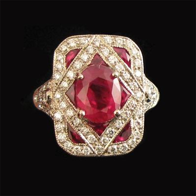 Appraisal: An Art Deco style ruby and diamond cluster ring the